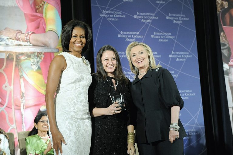 Safak_Pavey_with_Hillary_Rodham_Clinton_and_Michelle_Obama_at_2012_IWOC_Award
